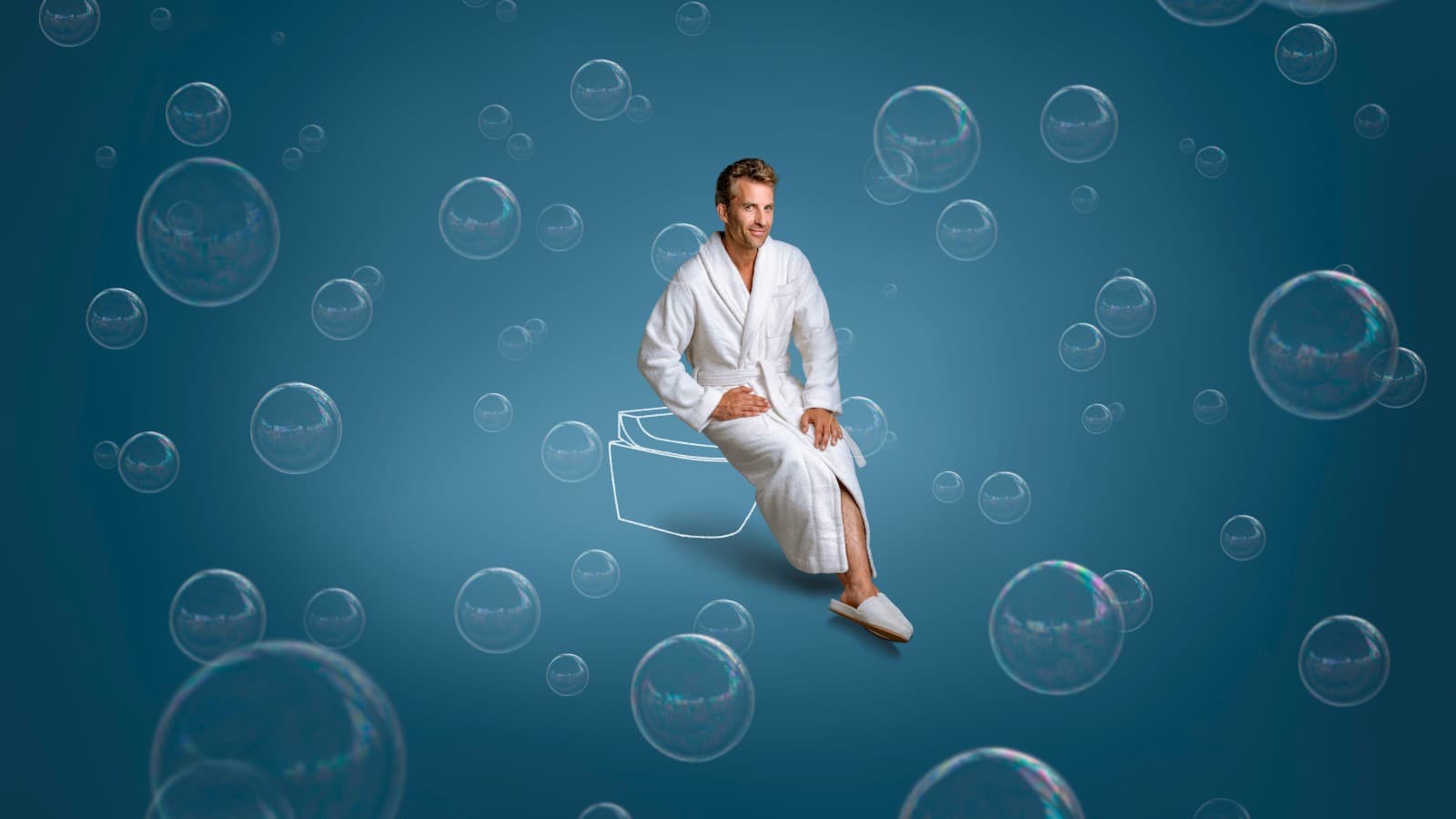 Tim sedi na Geberit AquaClean Tuma WC šolji sa tušem. Tim sedi na Geberit AquaClean Tuma WC šolji sa tušem.