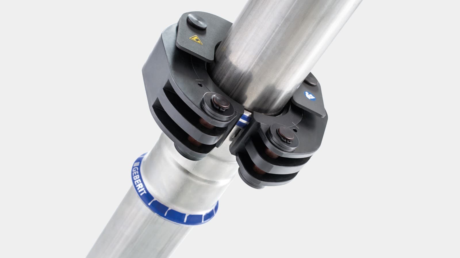 Zaustavni mehanizam fiksira Geberit obujmicu za stiskanje na Geberit Mapress spojnom elementu Zaustavni mehanizam fiksira Geberit obujmicu za stiskanje na Geberit Mapress spojnom elementu